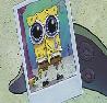 squidward holding a picture of sad spongebob