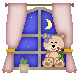 little teddy bear in window
